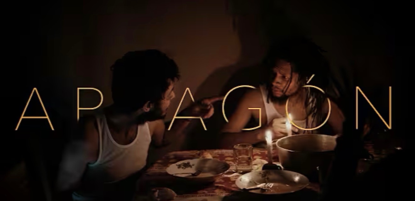 Apagón — candlelit title still from the FilmGate-winning music video